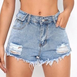 ripped Jean shorts